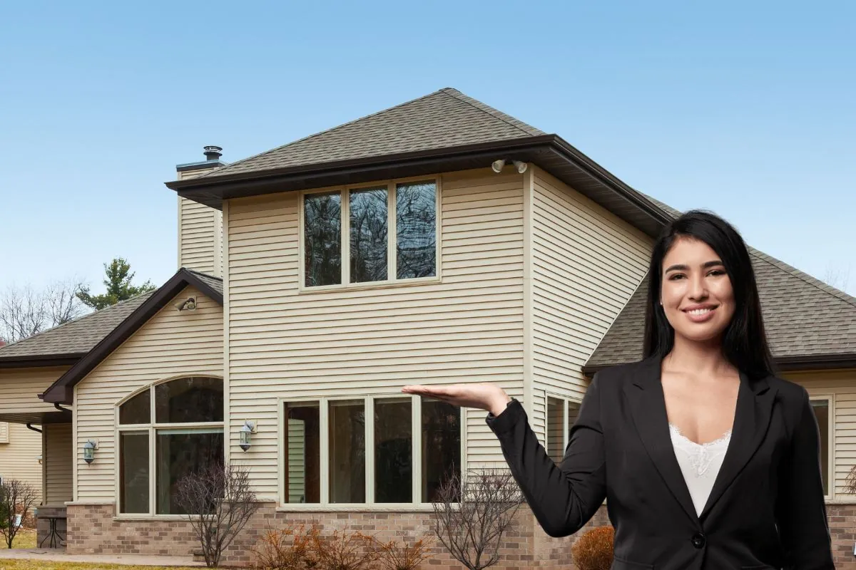 female showing two storey house with siding