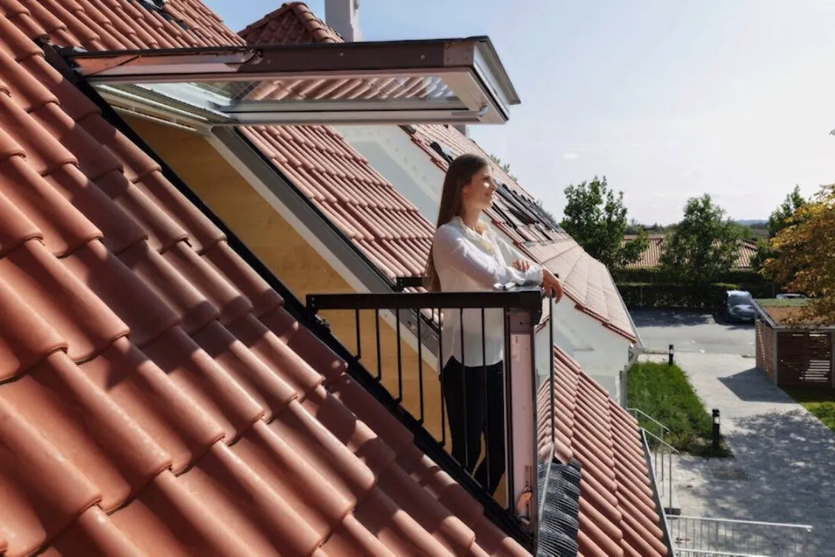 woman on roof relaxing